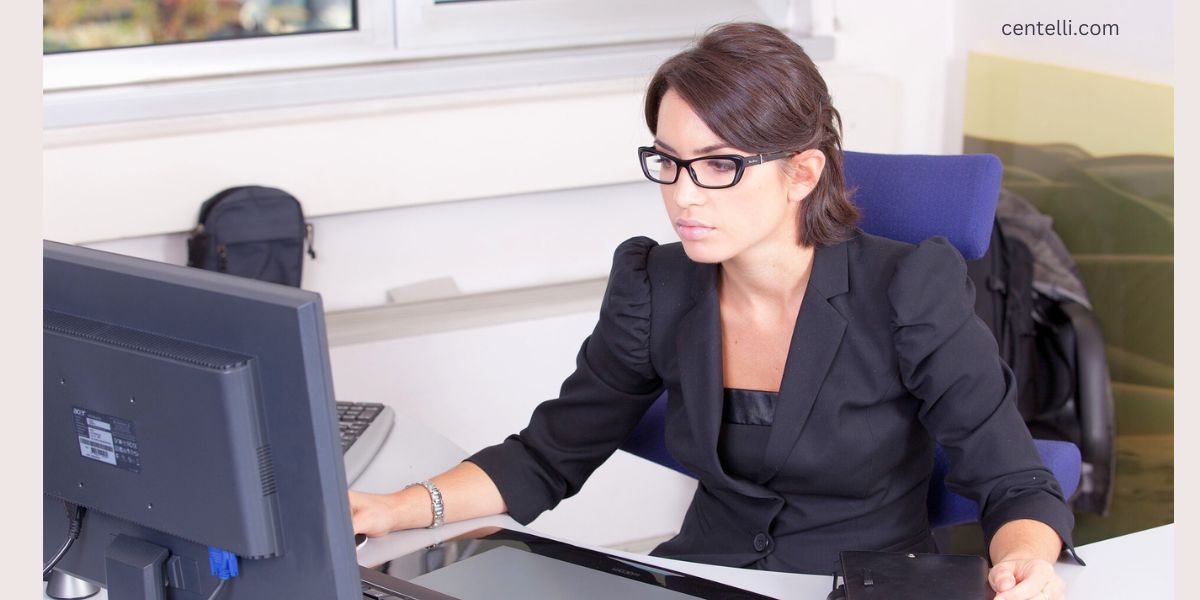 Female Accountant Working on Desktop